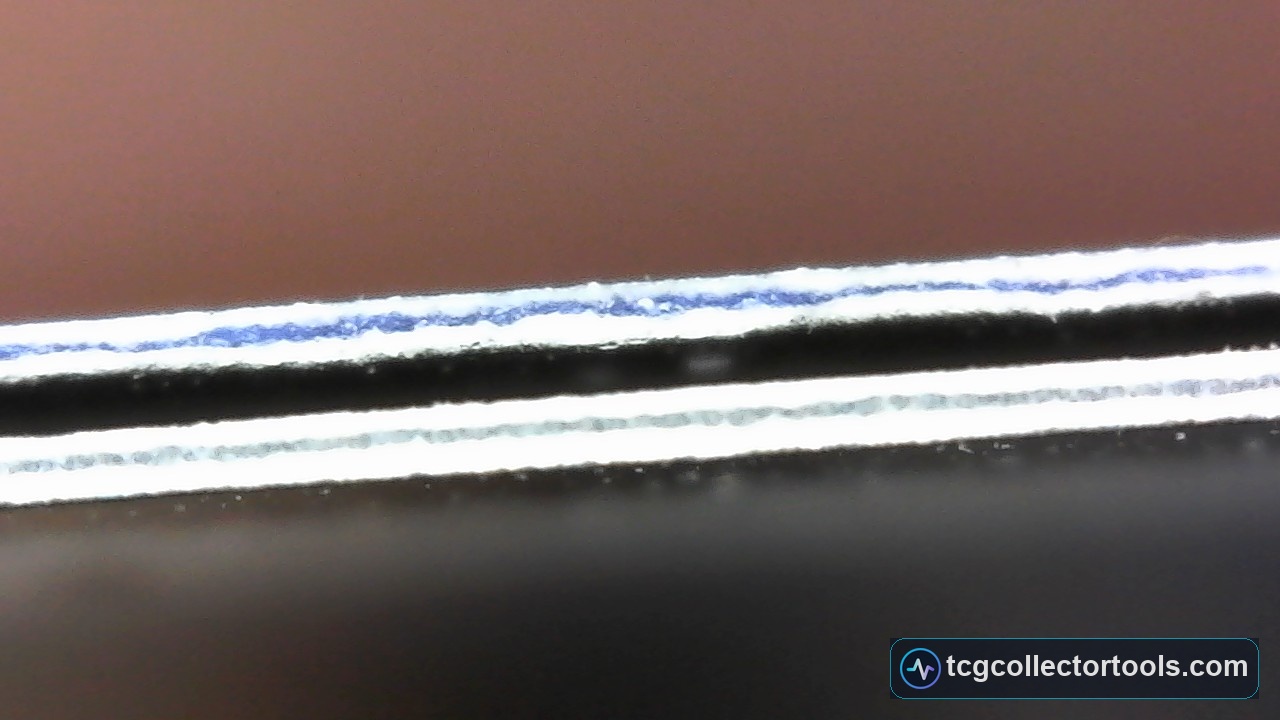 Side-on macro of a genuine Magic card showing a continuous blue core layer between the outer paper layers.