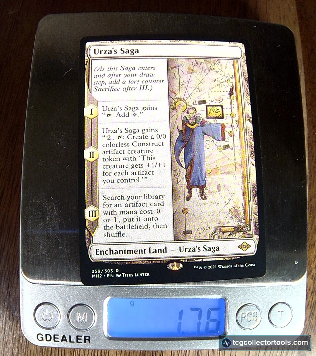 A counterfeit Urza's Saga card on a digital scale reading 1.76 grams.