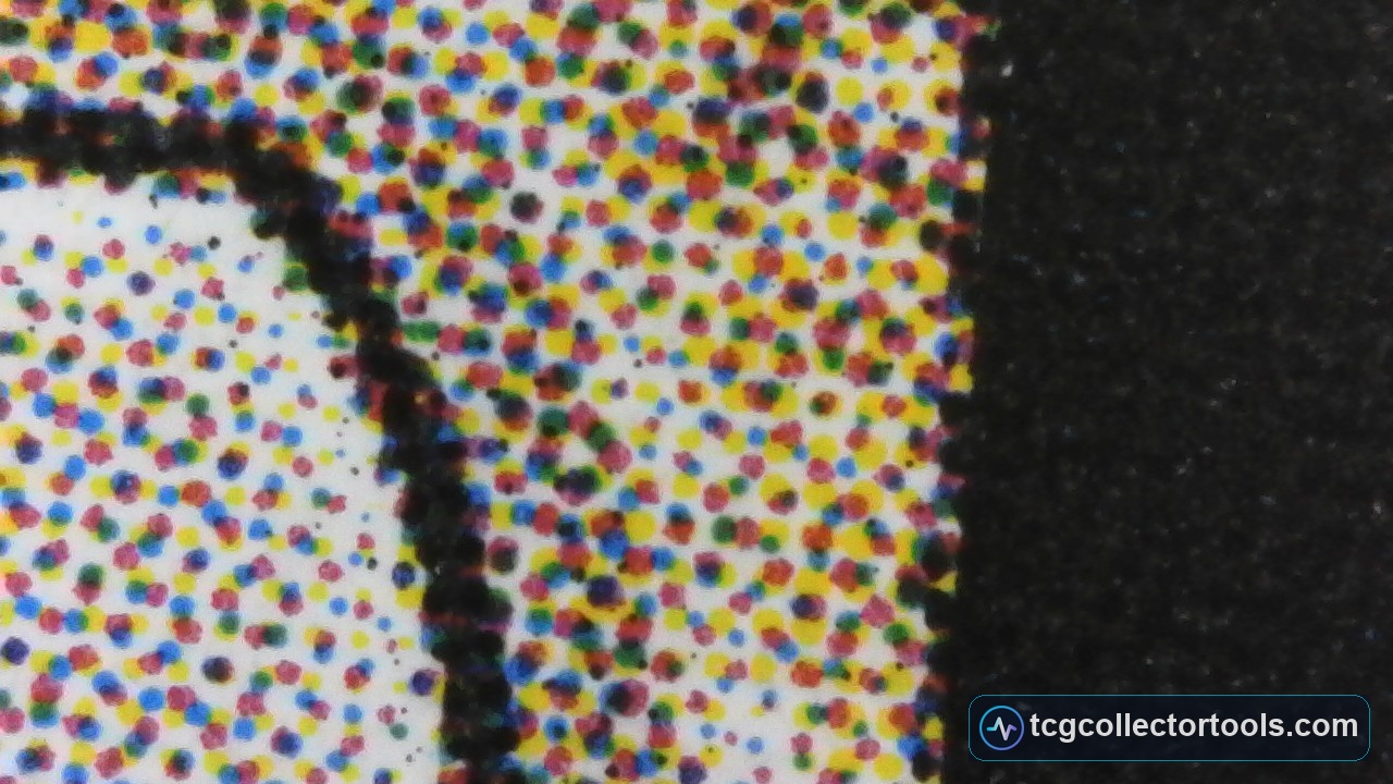 Macro of a counterfeit Magic card black frame border, showing a broken edge where colour printing pushes into the black.