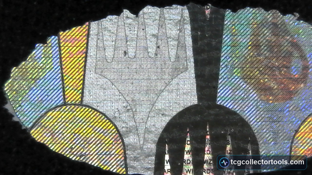 Extreme macro of a counterfeit Magic hologram showing a coarse diagonal cross-hatch pattern over blurred microtext.