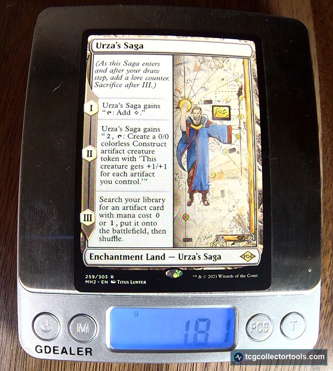 A genuine Urza's Saga card on a digital scale reading 1.81 grams.